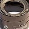 8. Lift the lens housing from its interior. Notice the matching slots on both the housing and the interior. These must be positioned correctly when you put it back together.